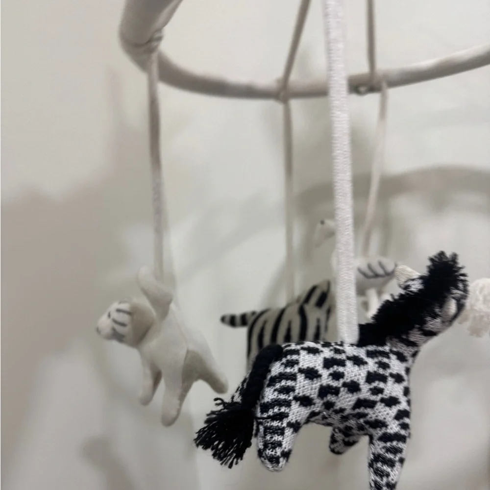 Crate & Barrel Baby Nursery safari animals mobile crib decor newborn neutral